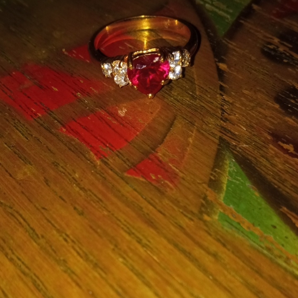 Gold Colored Ring with Red Gemstone Heart and Crystals